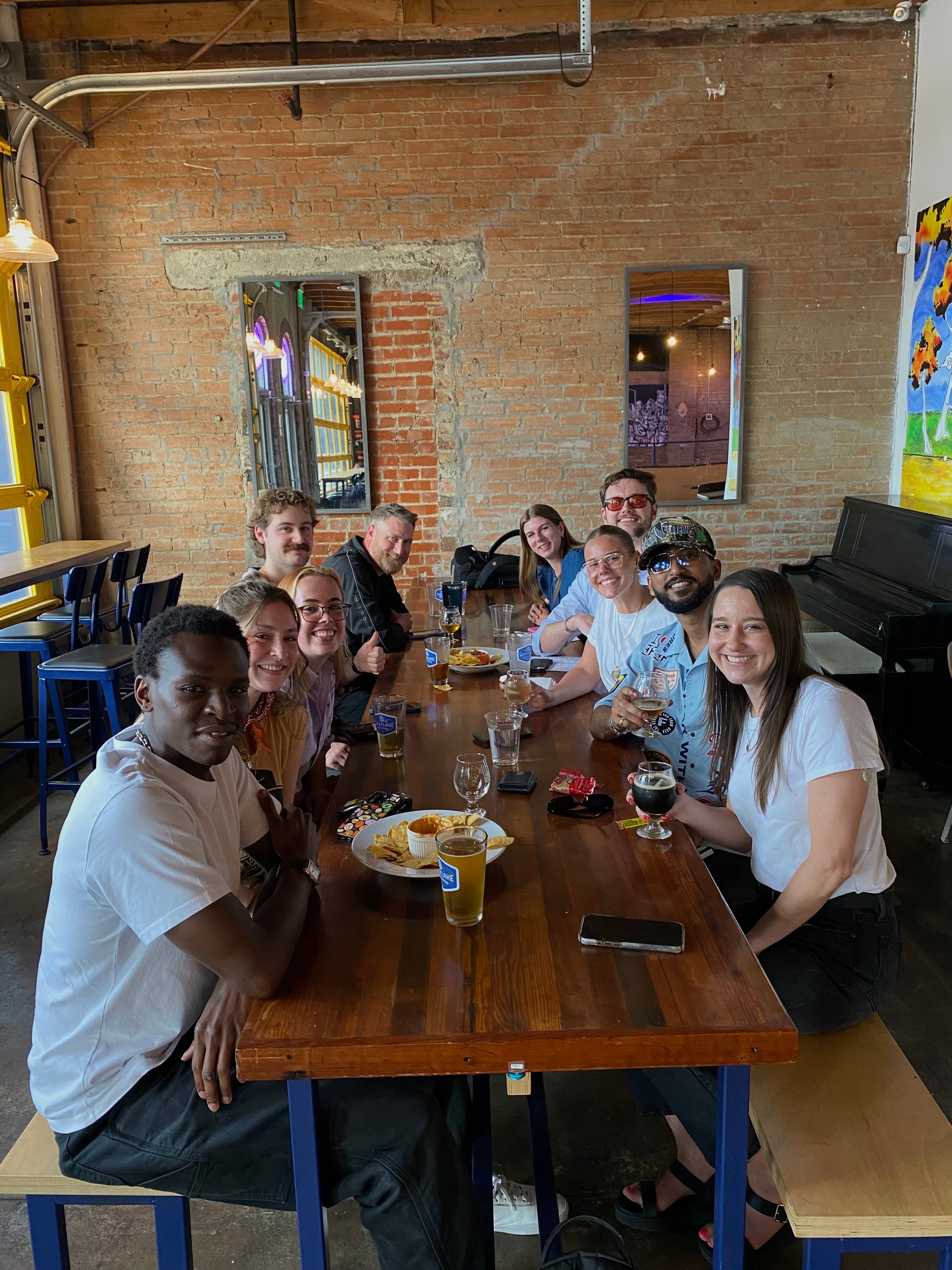 The TRG team gathered around a table