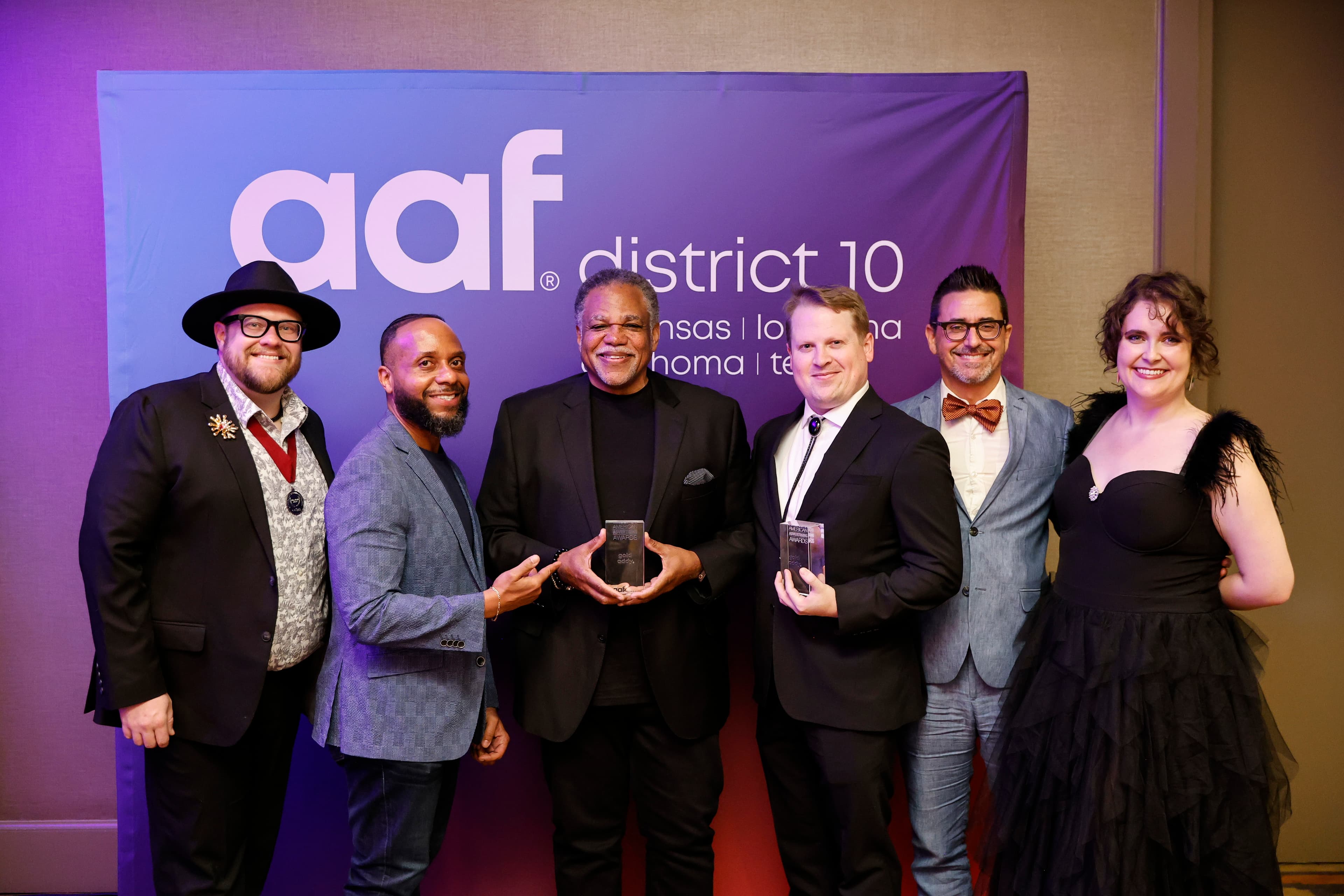 TRG accepting an AAF District 10 award